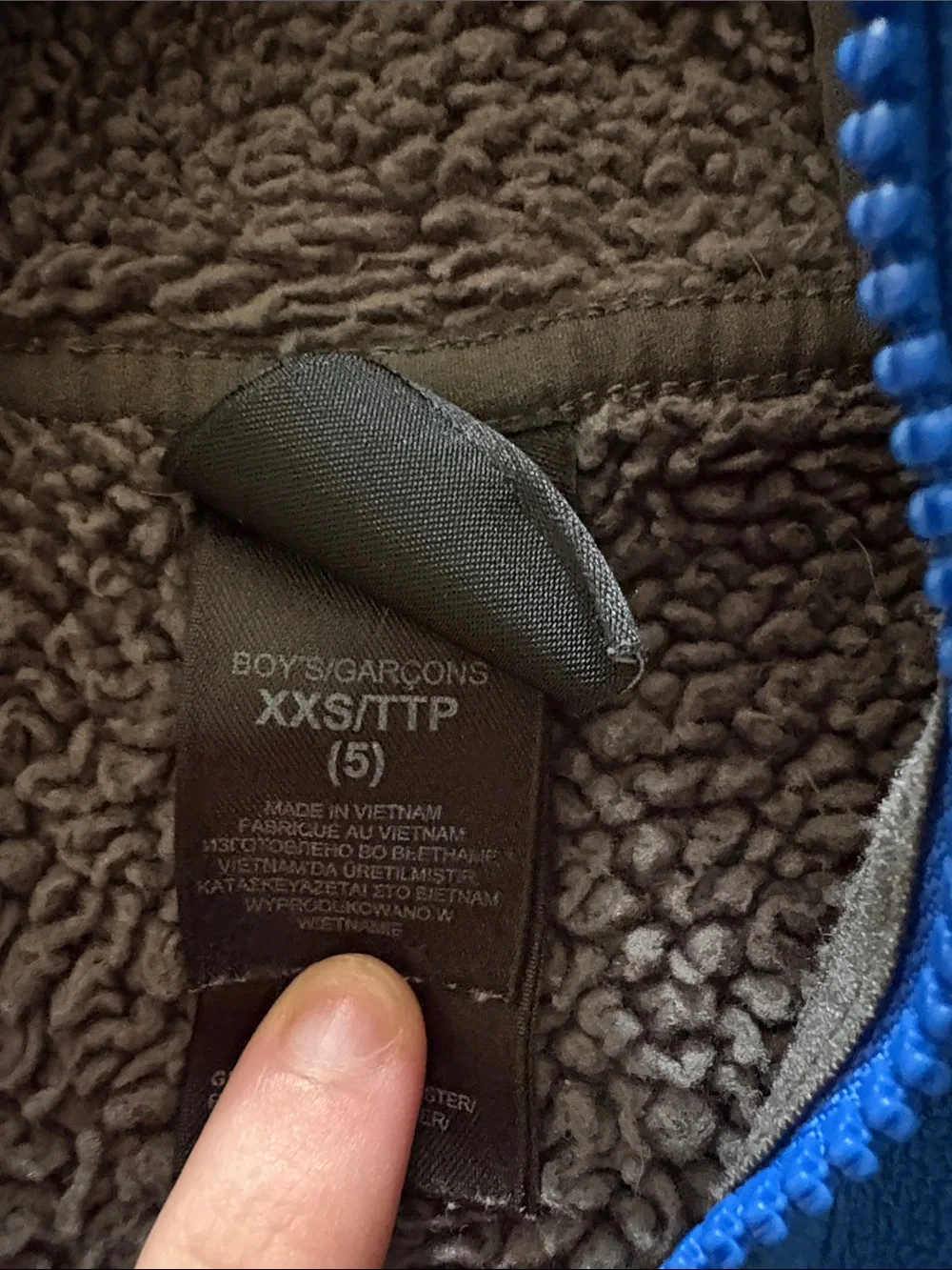 The North Face Kids Blue Hooded Fleece Jacket with Gray Pocket